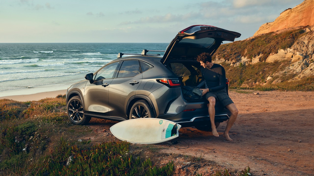 Lexus NX driving on a road