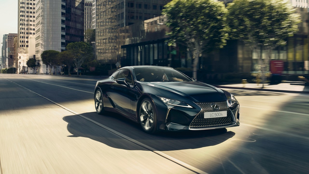 Lexus LC 500h driving in a city location