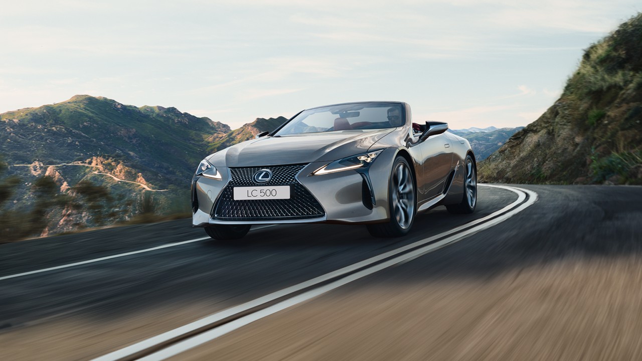 Lexus LC Convertible driving in a rural location  