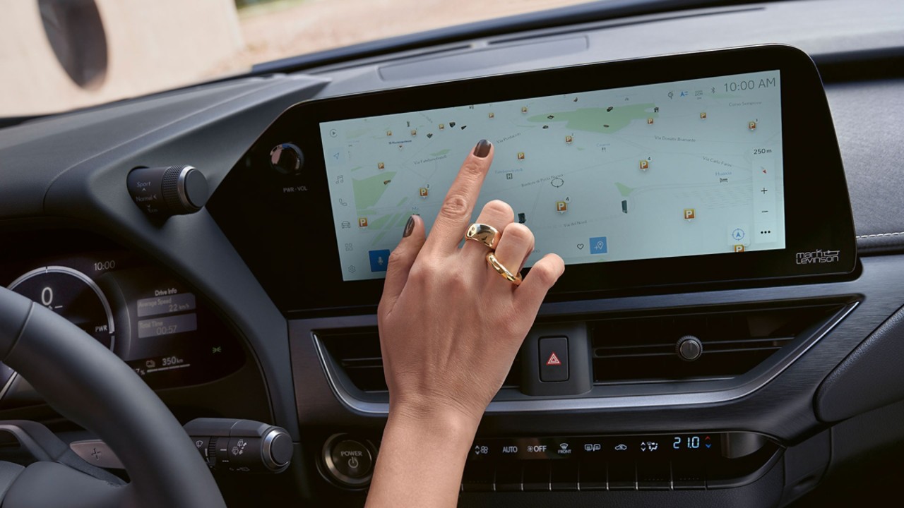 A person using the Lexus Link multimedia system
