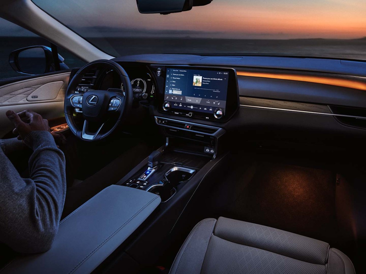 Front interior of the Lexus RX at night