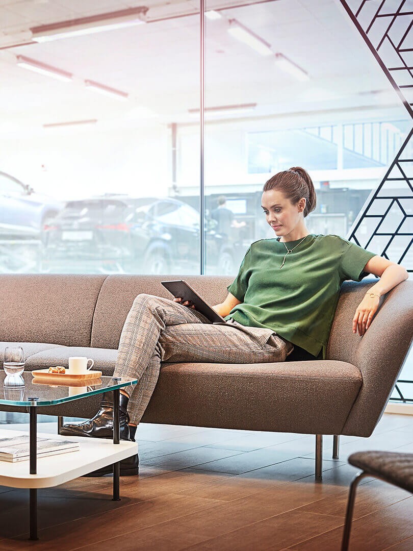 A woman sitting on a sofa 