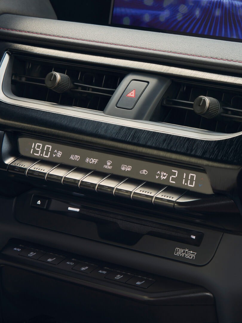 an interior close up of a lexus centre console
