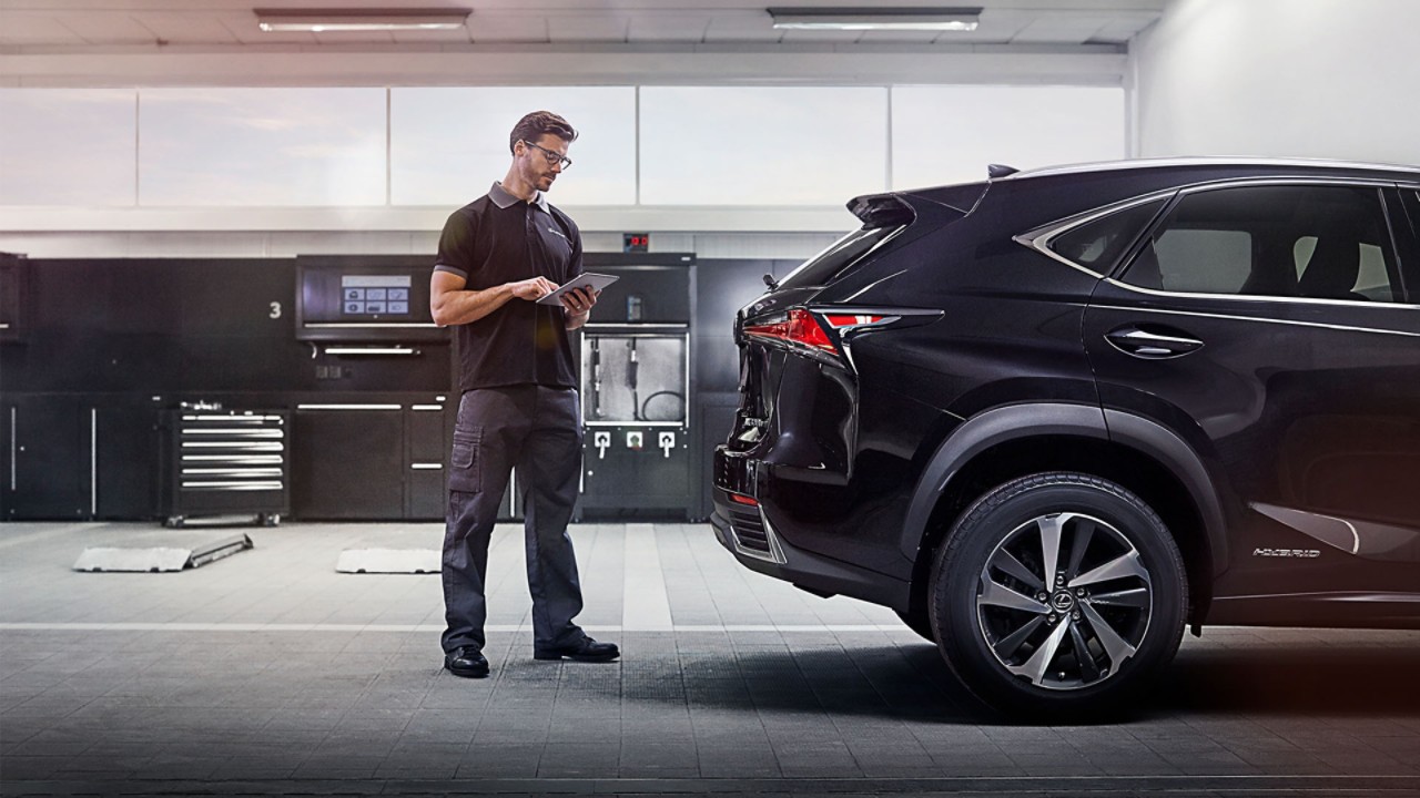 A Lexus mechanic working on a Lexus