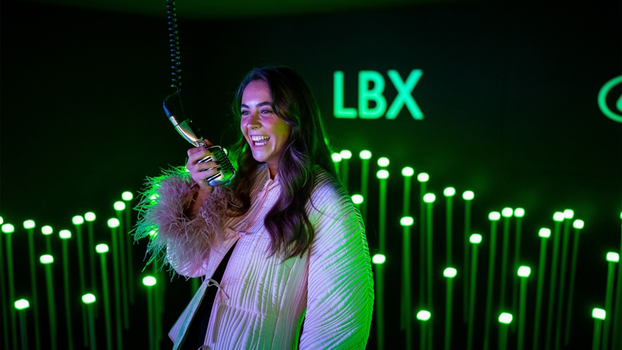 A singer at the Lexus LBX London Car Park City Event