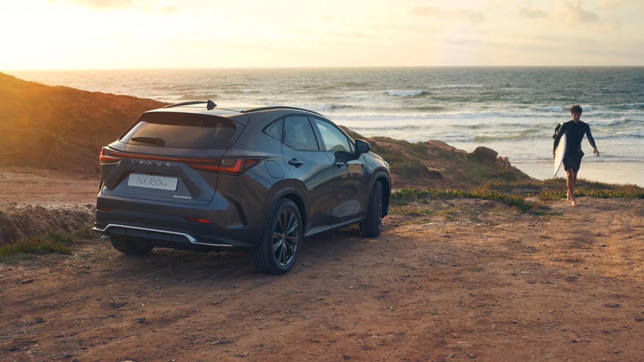 A Lexus NX parked on a coastline 