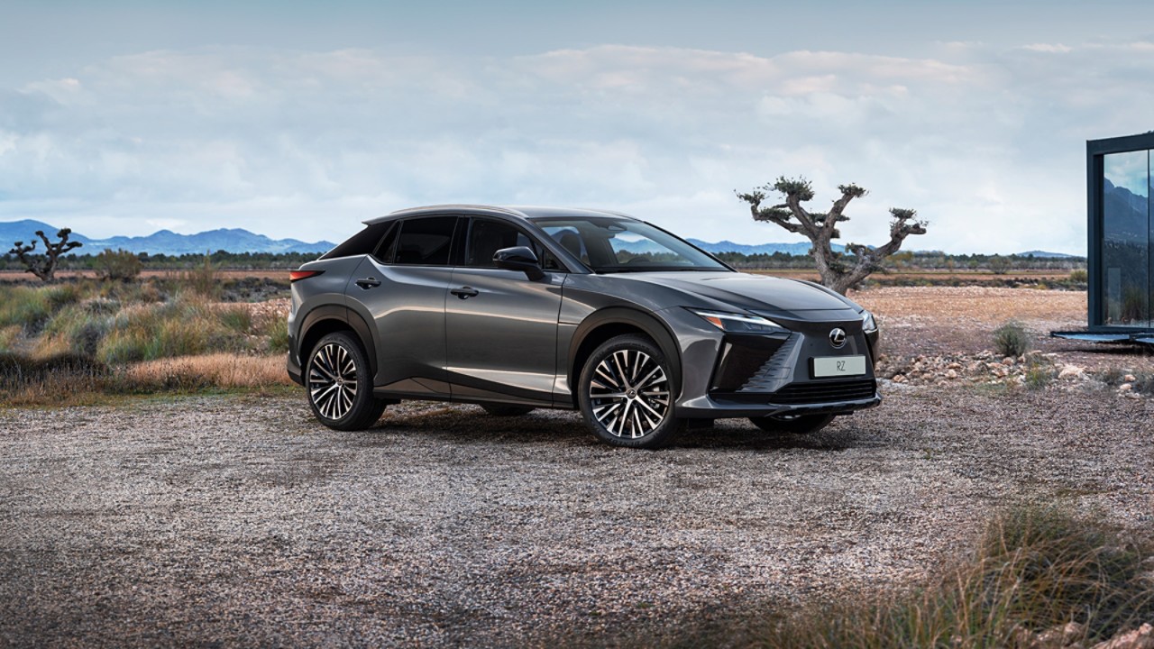 A Lexus RZ 450e parked in a rural location